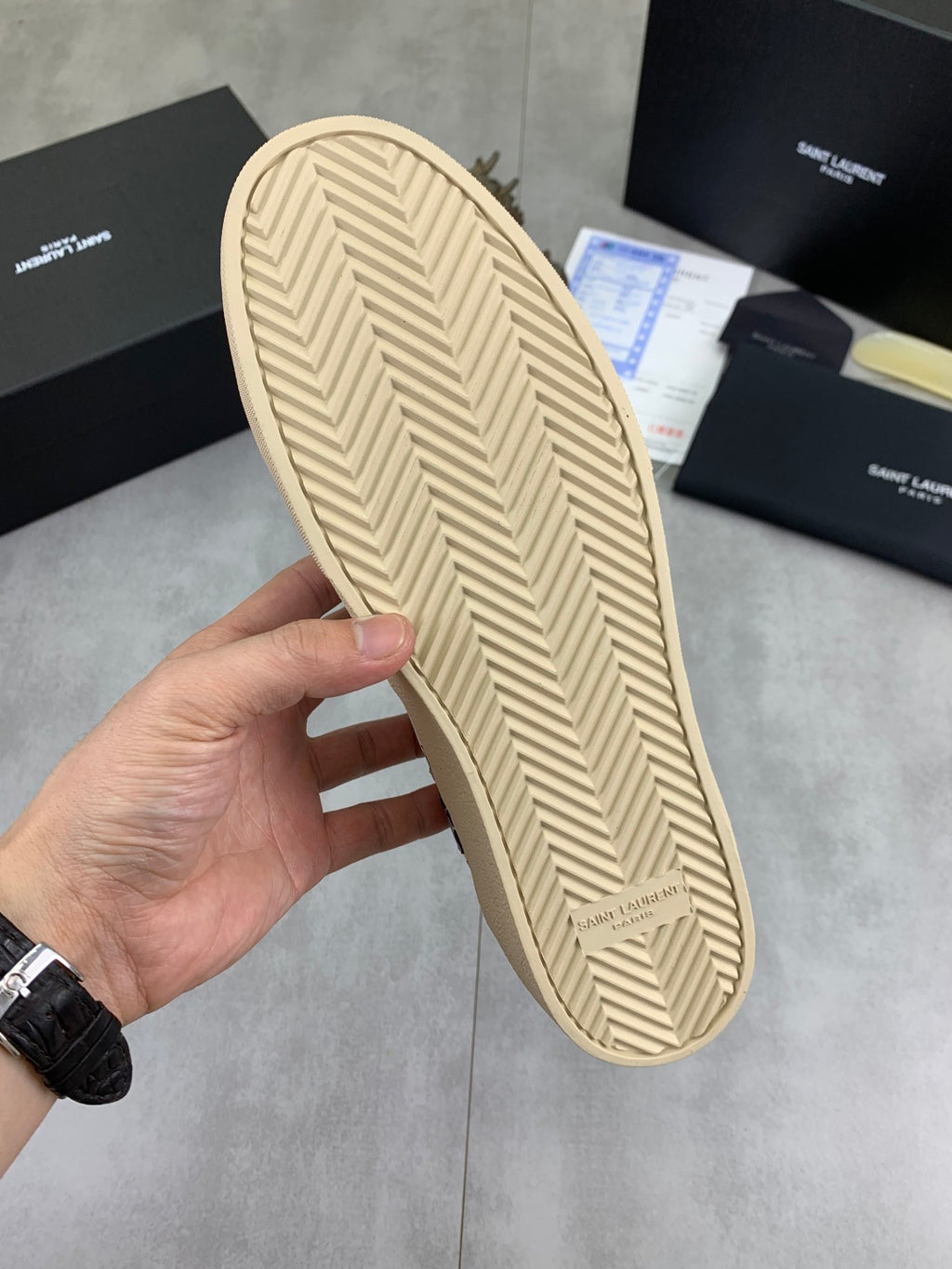 Unisex sneaker outsole in light beige with herringbone tread pattern