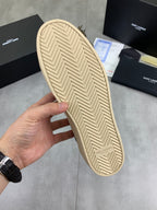 Unisex sneaker outsole in light beige with herringbone tread pattern
