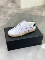 YSL unisex luxury shoes: white lace-up sneakers with star details and tan rubber sole