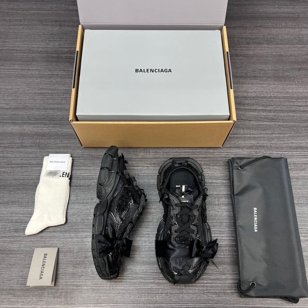 Balenciaga black lace-up sandals with open-work straps and rugged tread