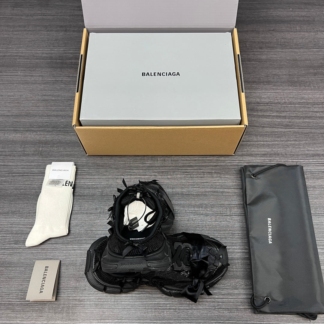 Balenciaga black lace-up sandals with tangled strap detail and cushioned sole