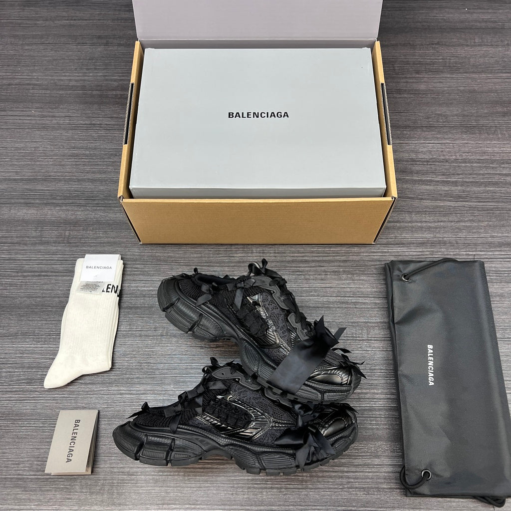Balenciaga black lace-up sandals with layered mesh-style straps and tread