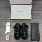 Balenciaga black lace-up sandals with knotted strap accents and chunky outsole