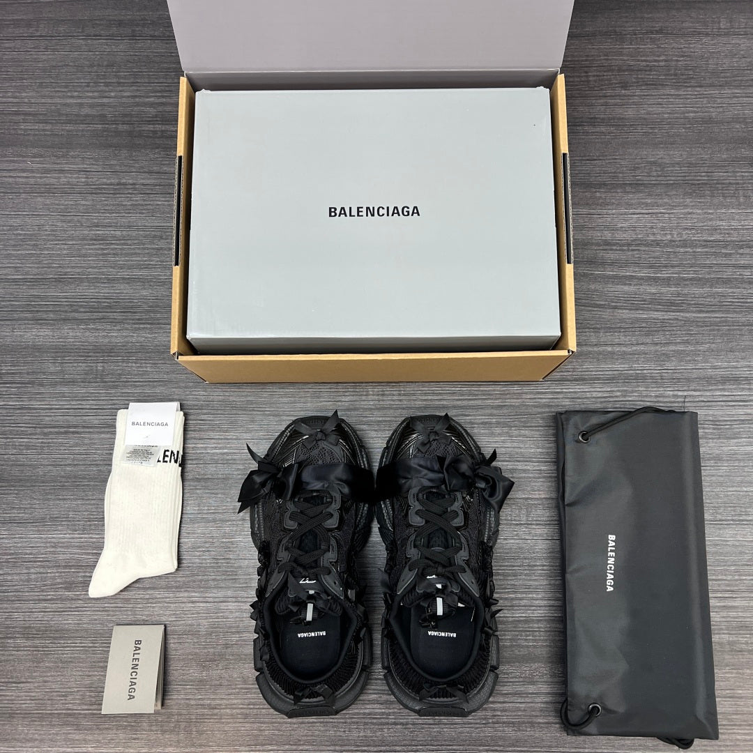 Balenciaga black lace-up sandals with knotted strap accents and chunky outsole