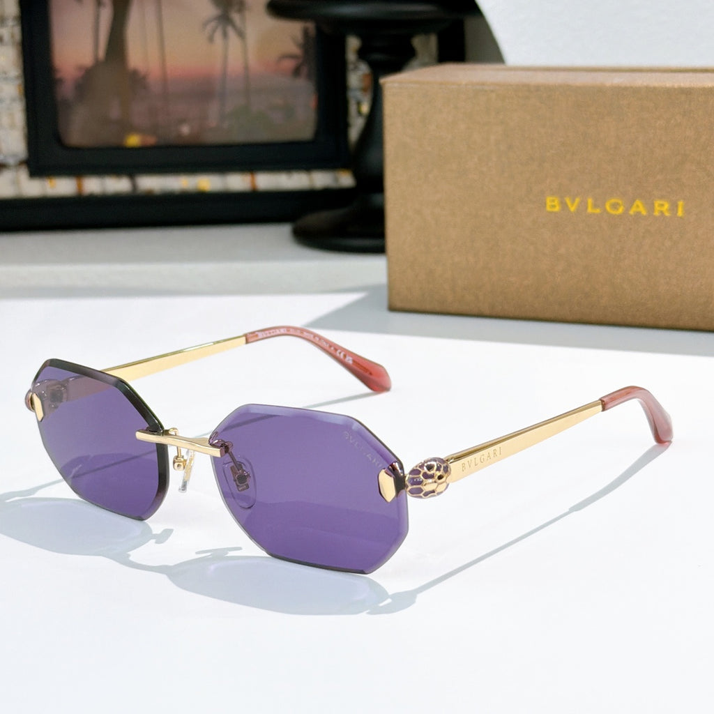 Gold-rimmed sunglasses with purple-tinted lenses and slim angular temples