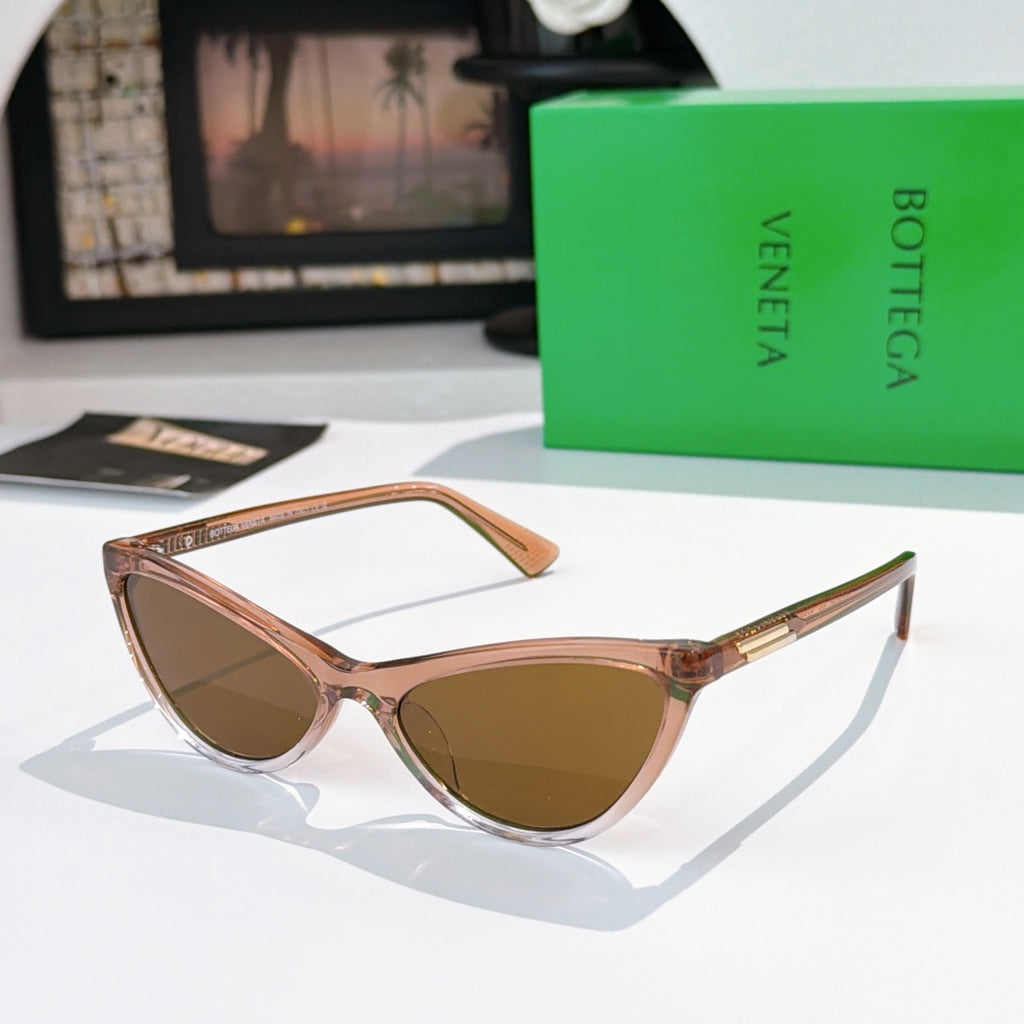 Cat-eye glasses with light tortoiseshell frame and brown tinted lenses
