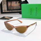 Cat-eye glasses with light tortoiseshell frame and brown tinted lenses
