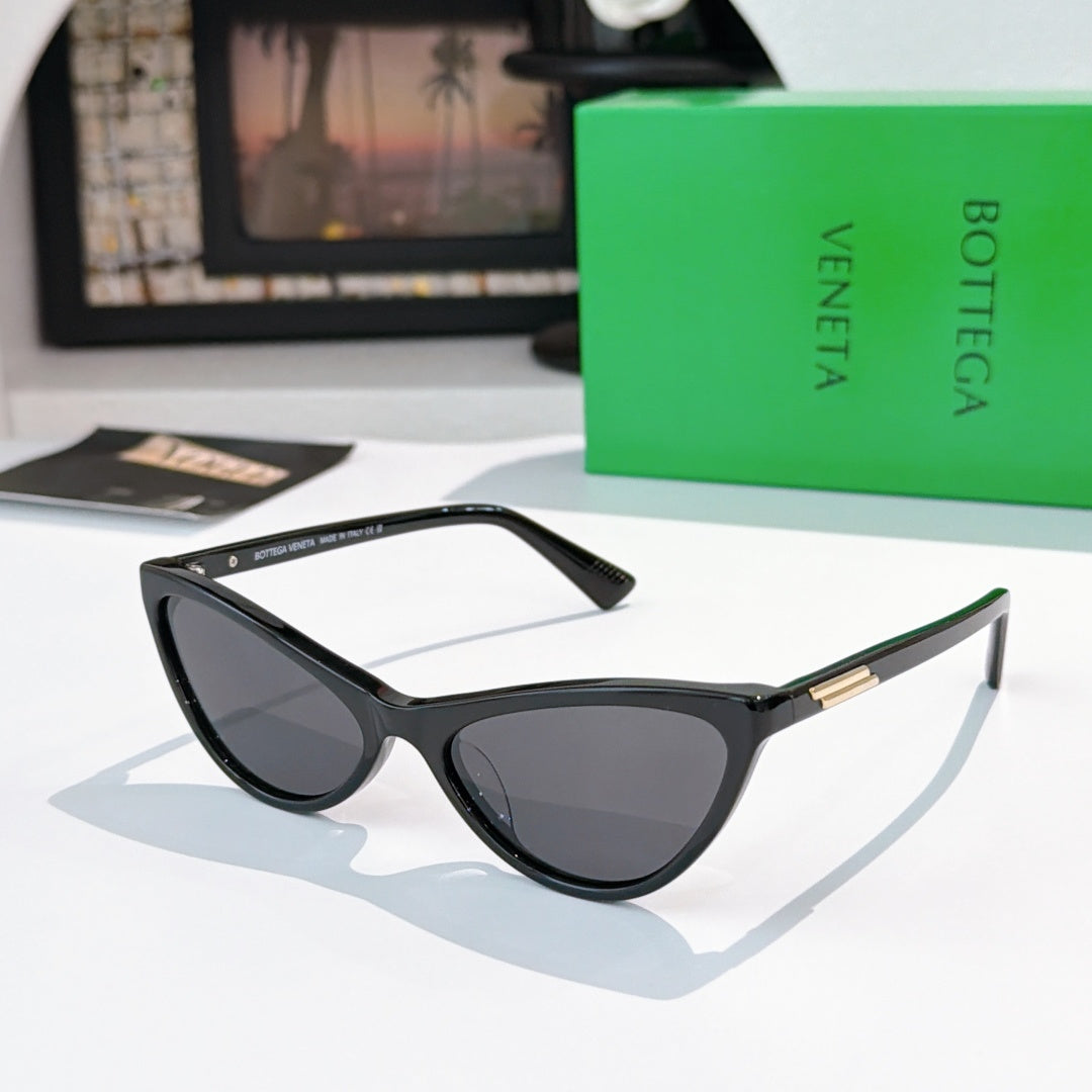 Cat-eye glasses with black frame and dark gray lenses