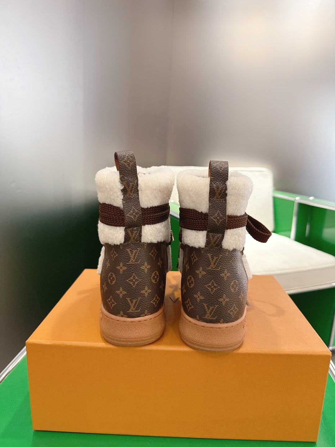 Louis Vuitton high-top sneakers back view, brown monogram with white fleece ankle trim
