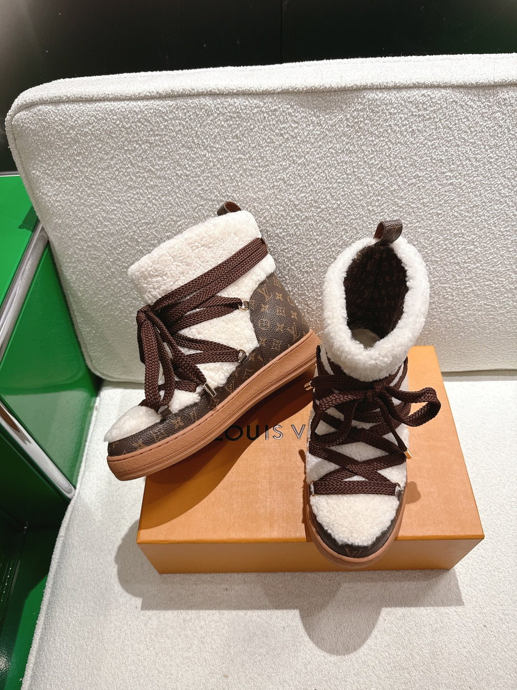 Louis Vuitton high-top sneakers pair view, brown monogram, white fleece lining, lace-up