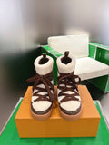 Louis Vuitton high-top sneakers with brown monogram and white shearling trim, lace-up