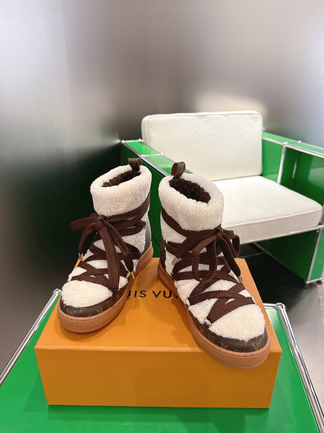 Louis Vuitton high-top sneakers, white fleece cuffs, brown lace-up uppers with monogram