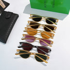 Assorted Bottega Veneta sunglasses with gold frames and tinted oval lenses