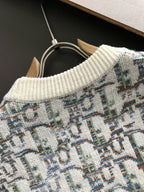 Dior knit sweater collar and upper chest, cream ribbing with multicolor pattern