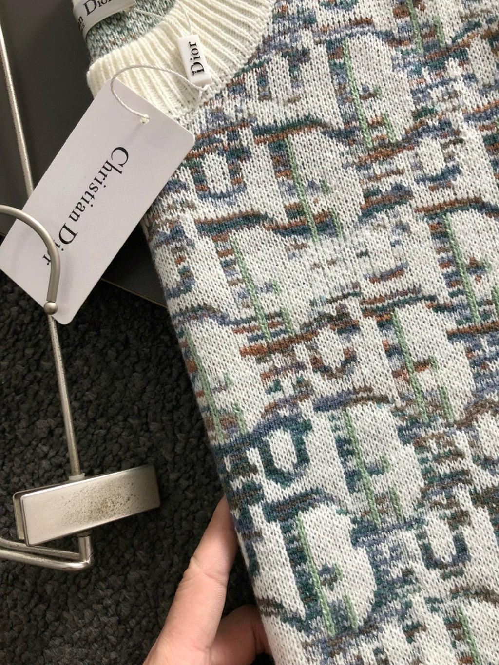 Dior knit sweater knit texture detail, cream yarn with multicolor geometric motifs