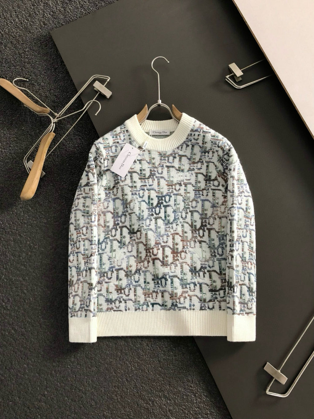 Dior knit sweater on hanger, cream ribbed cuffs and hem, multicolor geometric knit