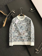 Dior knit sweater on hanger, cream ribbed cuffs and hem, multicolor geometric knit