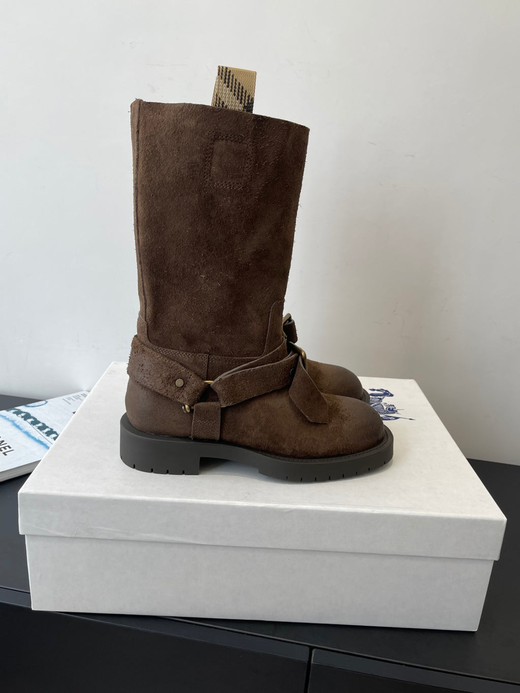 Burberry dark brown suede knee-high boots, front view with double buckle strap