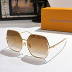 Louis Vuitton sunglasses with gold frames and light brown gradient lenses