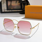 Louis Vuitton sunglasses with gold frames and pink gradient lenses