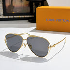 Louis Vuitton aviator sunglasses, gold frame, dark gray-tinted lenses