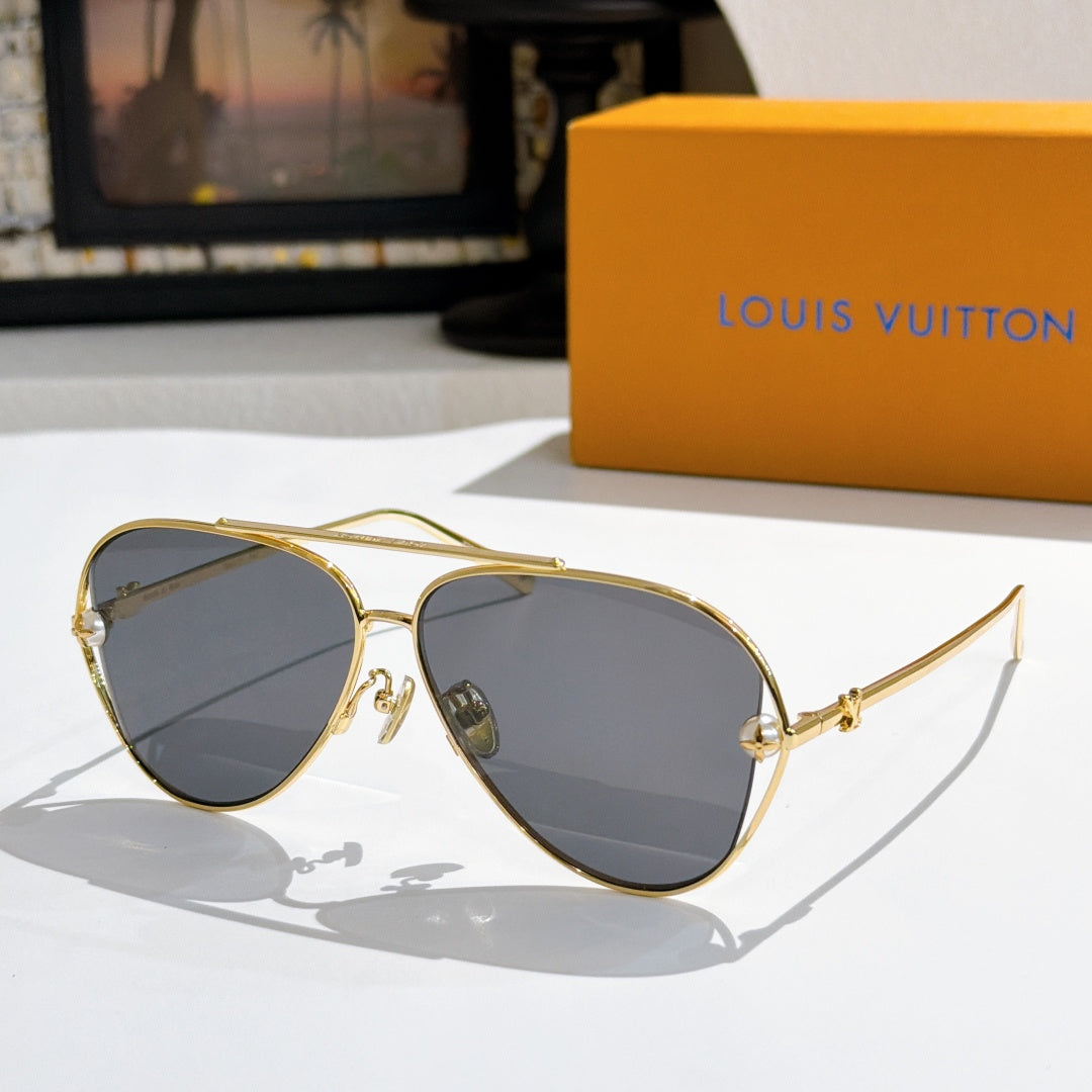Louis Vuitton aviator sunglasses, gold frame, dark gray-tinted lenses
