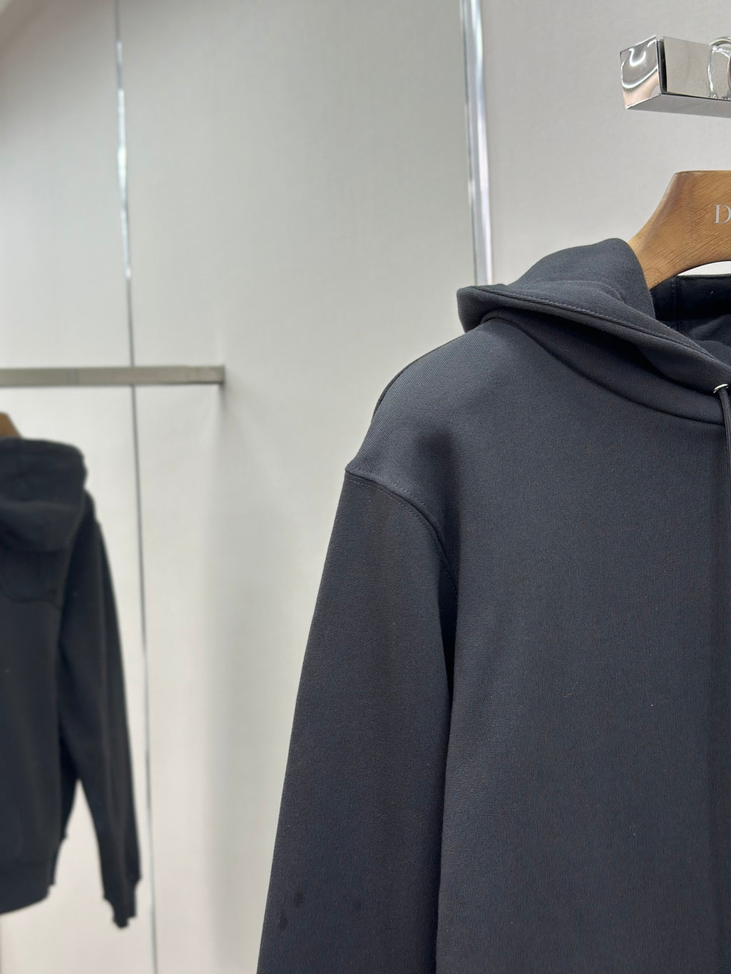 Dark blue hoodie back view, hood and drawstring with long sleeves