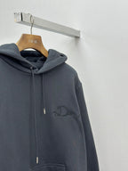 Dark blue pullover hoodie with hood, drawstring, and embroidered logo on chest