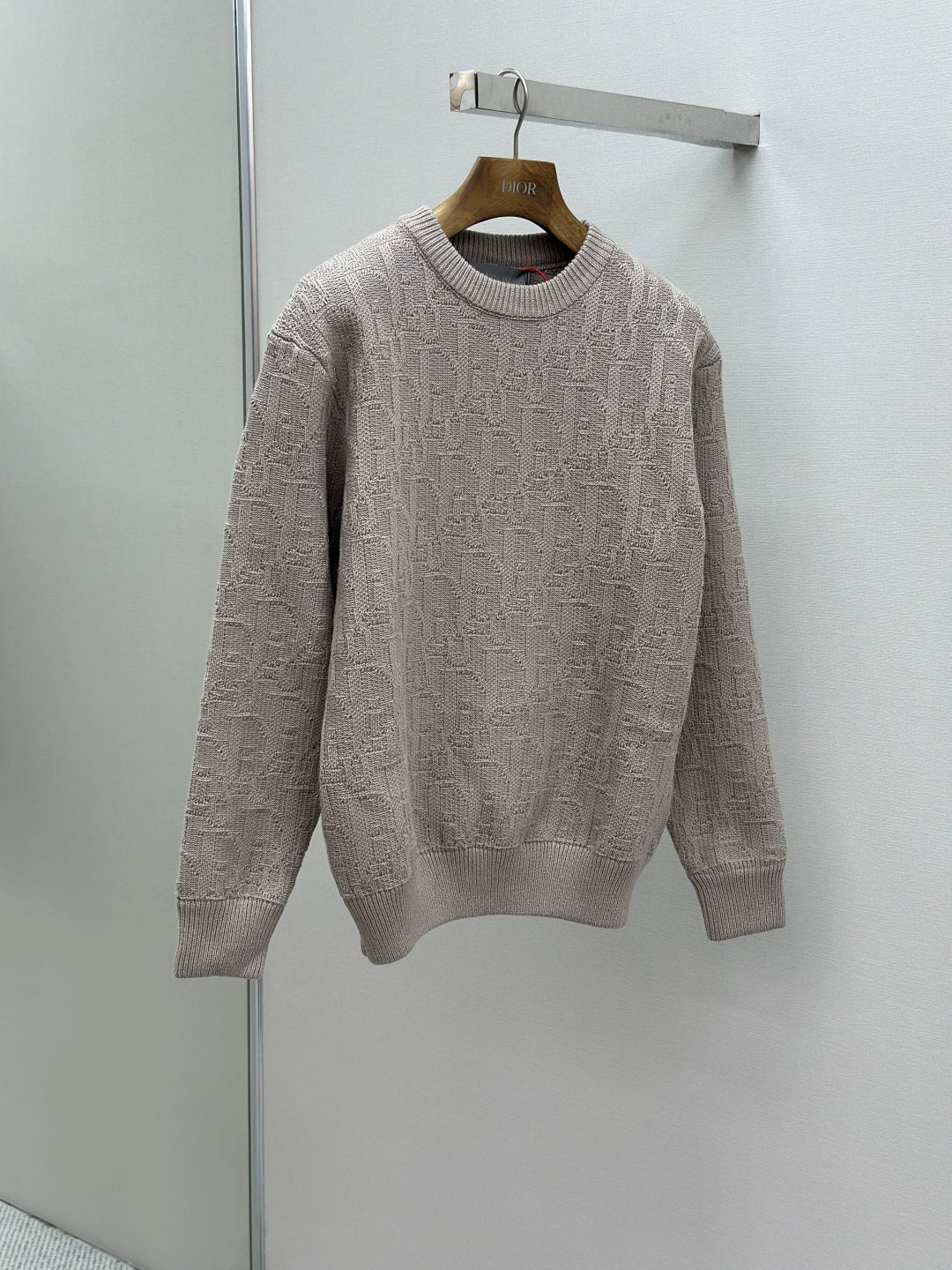 Dior mauve logo knit sweater on hanger, long sleeves and crewneck