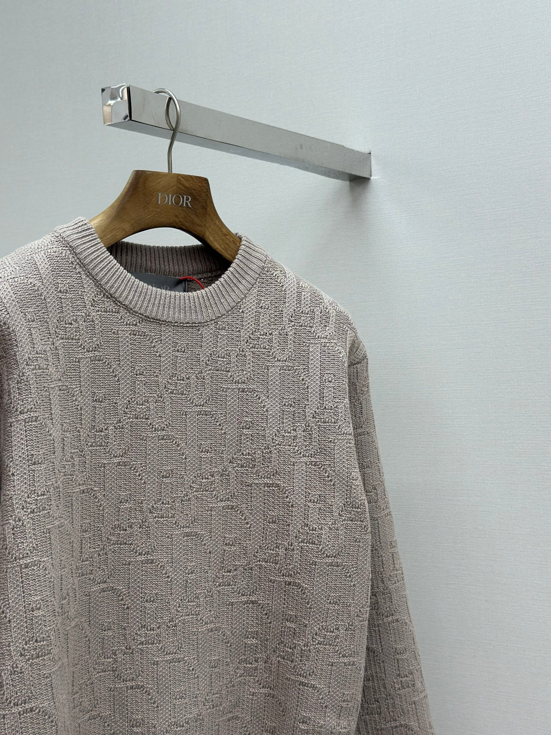 Dior mauve logo knit sweater close-up, allover logo knit and crewneck