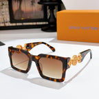Louis Vuitton square sunglasses, tortoiseshell frame with gold logo detail and amber-tinted lenses