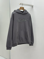 Dark gray long-sleeve hoodie with hood, front pocket, and Louis Vuitton logo