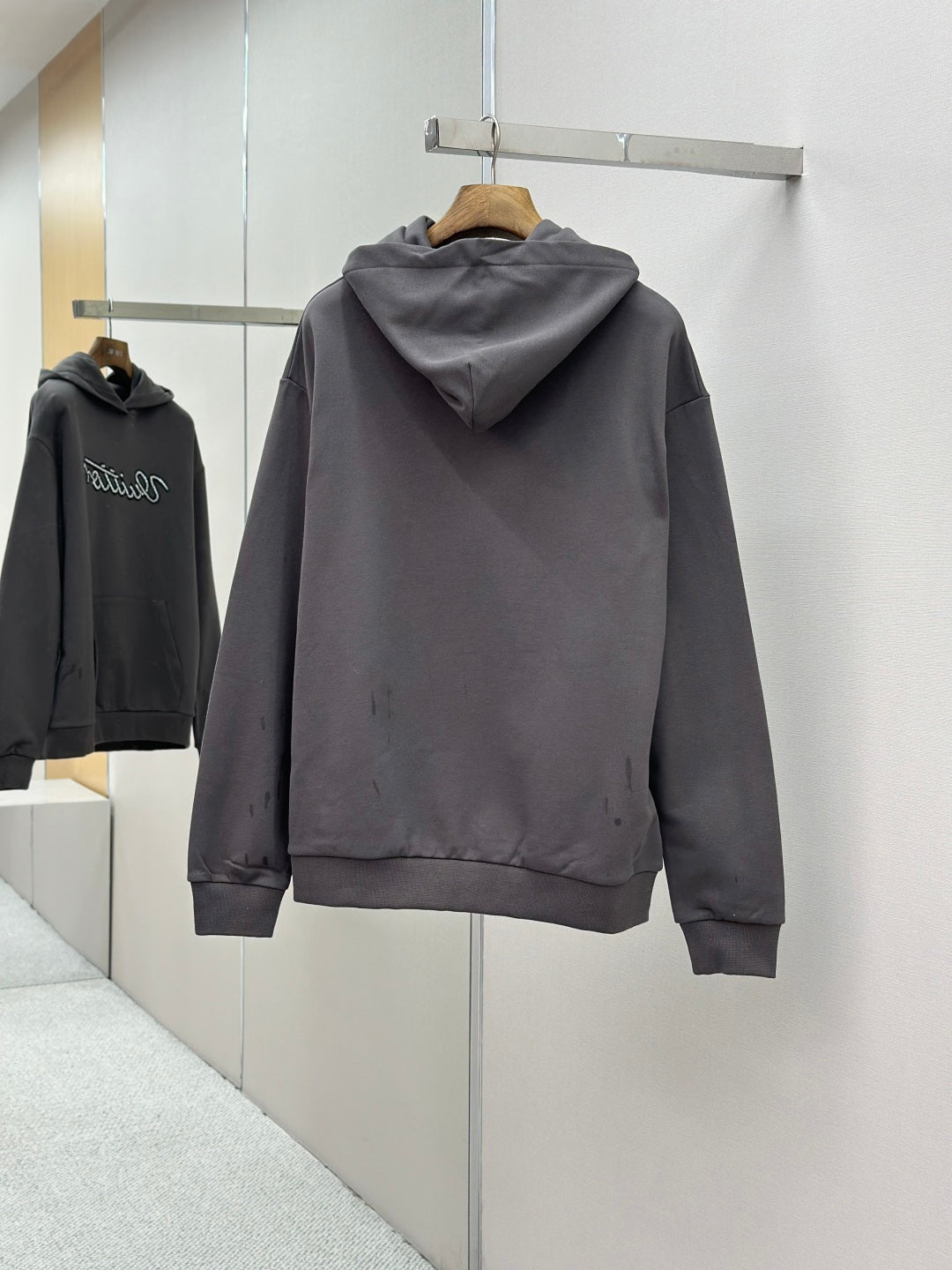 Dark gray long-sleeve hoodie with hood and front pockets, Louis Vuitton logo
