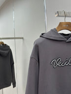 Dark gray hoodie sleeve and chest with Louis Vuitton logo, hooded sweatshirt