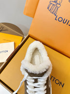 Brown sneaker with white plush collar and white lace-up eyelets
