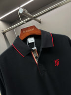 Long-sleeve polo shirt with red-trim collar and monogram logo on chest