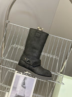 Black suede tall boots with side buckle strap and low platform sole