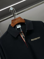 Black Burberry long-sleeve polo shirt collar detail with logo