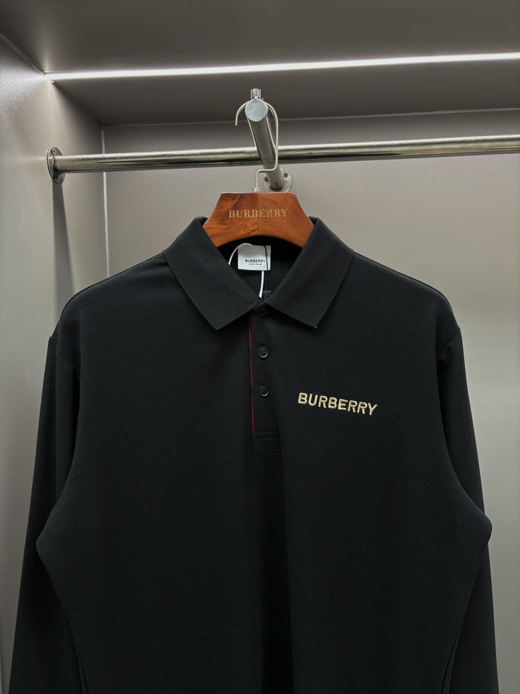 Black Burberry long-sleeve polo shirt with spread collar and chest logo