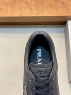 Prada unisex sneaker tongue with PRADA logo, dark leather, lace-up