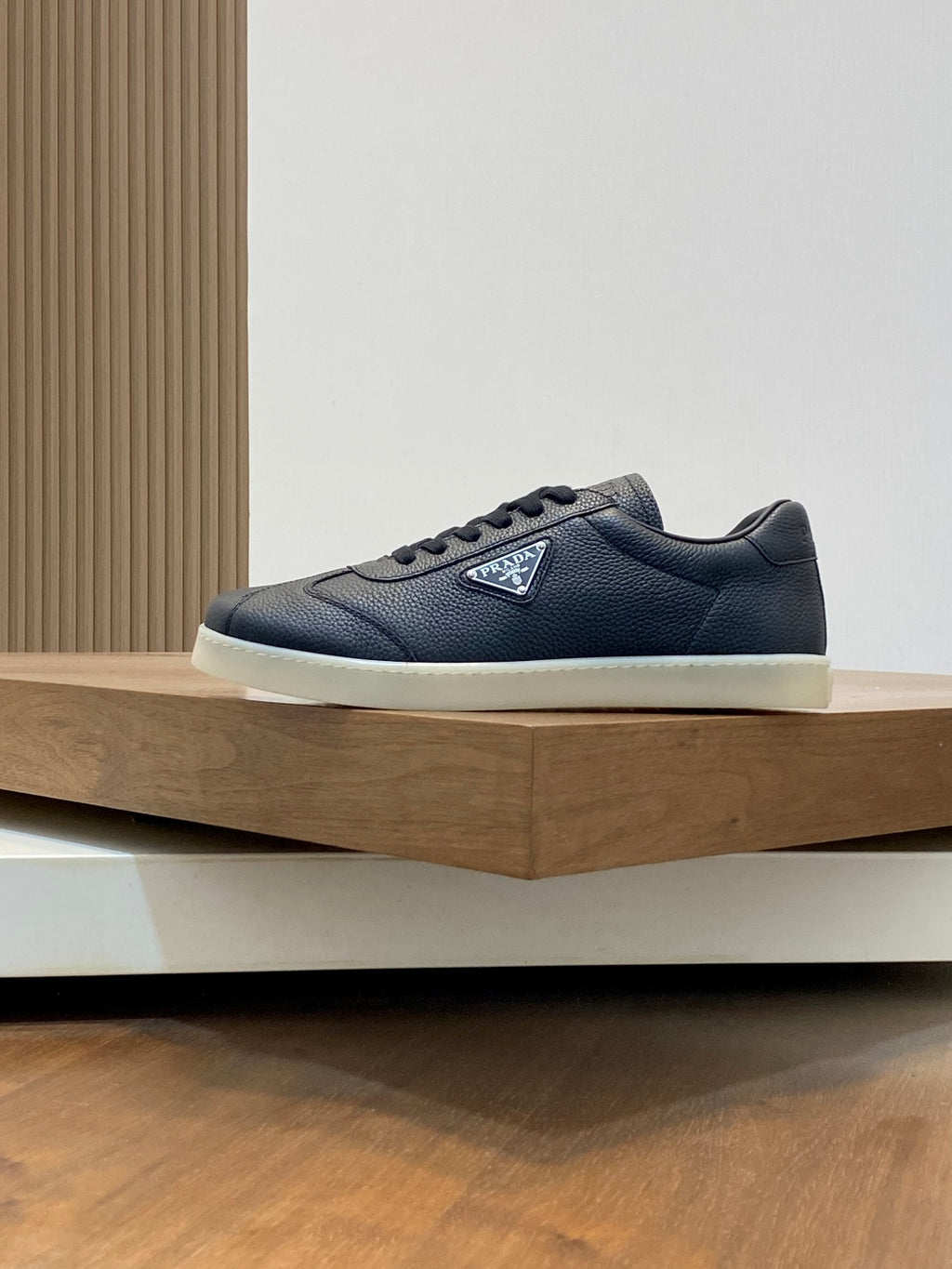 Prada unisex low-top sneakers, dark navy textured leather, lace-up, white sole