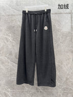 Charcoal grey sweatpants, elastic waistband, straight loose legs, drawstring