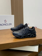 Moncler dark lace-up sneakers with MONCLER logos and chunky tread sole