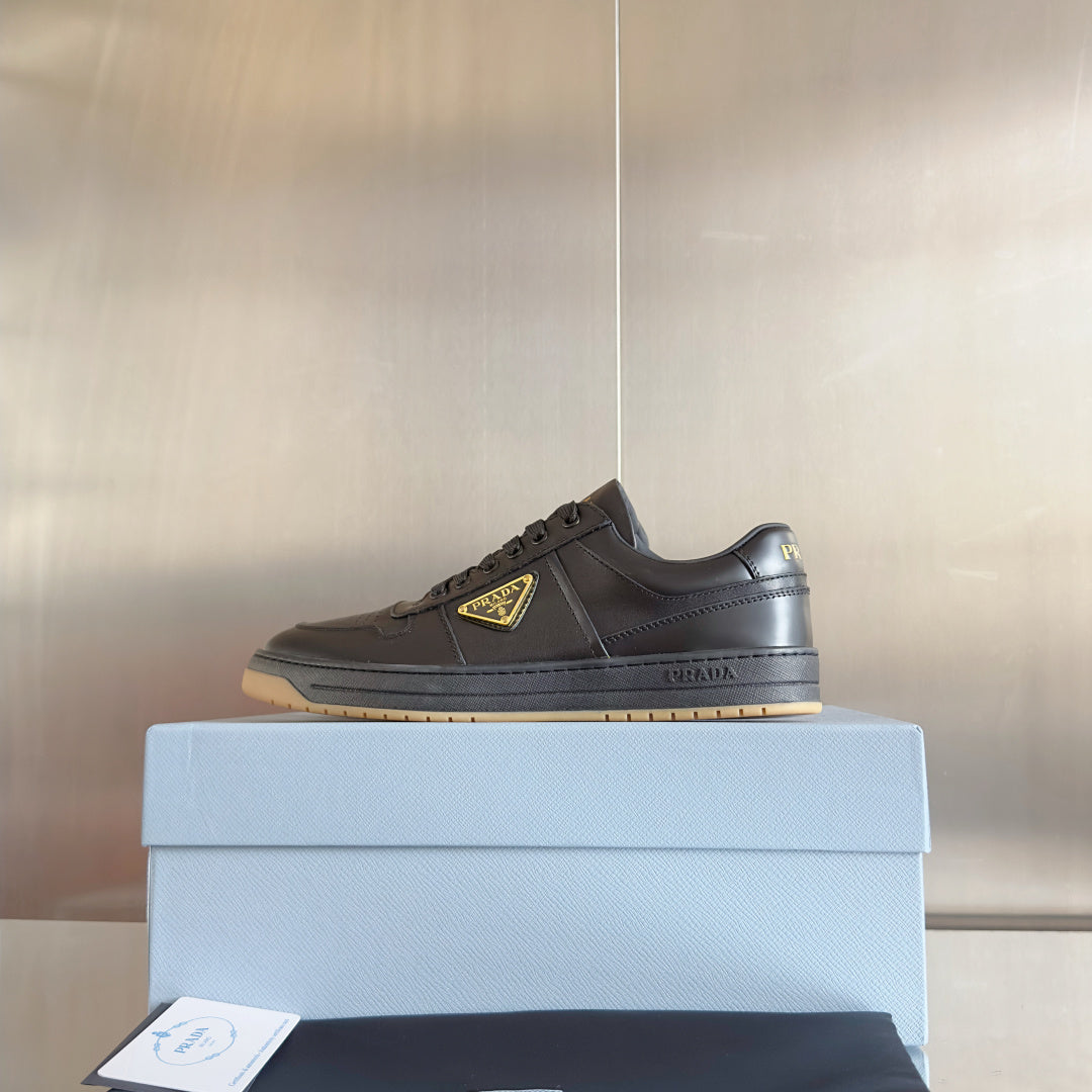 Prada unisex sneakers, dark brown leather, lace-up with yellow-trim triangular logo