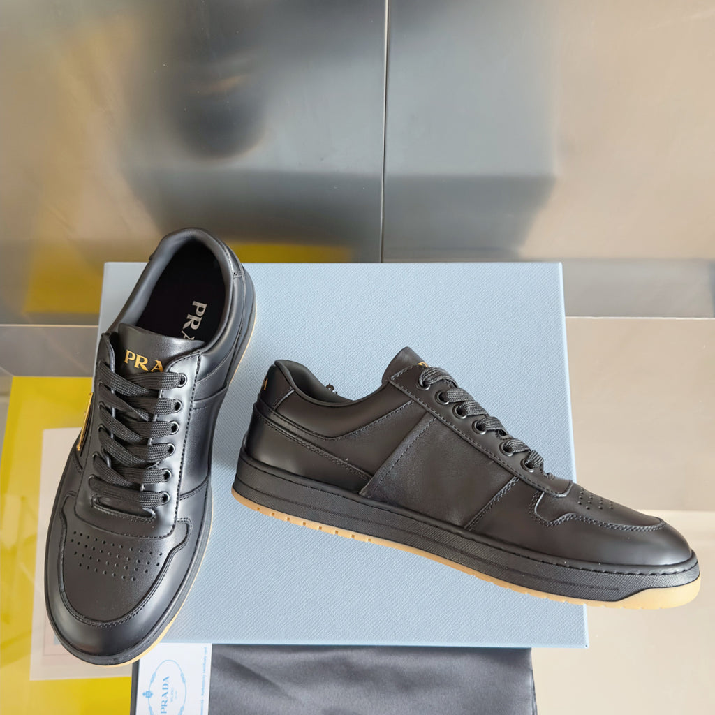 Prada unisex sneakers, dark gray leather, lace-up with perforated detailing and gum sole
