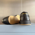 Prada unisex sneakers heel and sole, dark leather with gum tread, pair on box