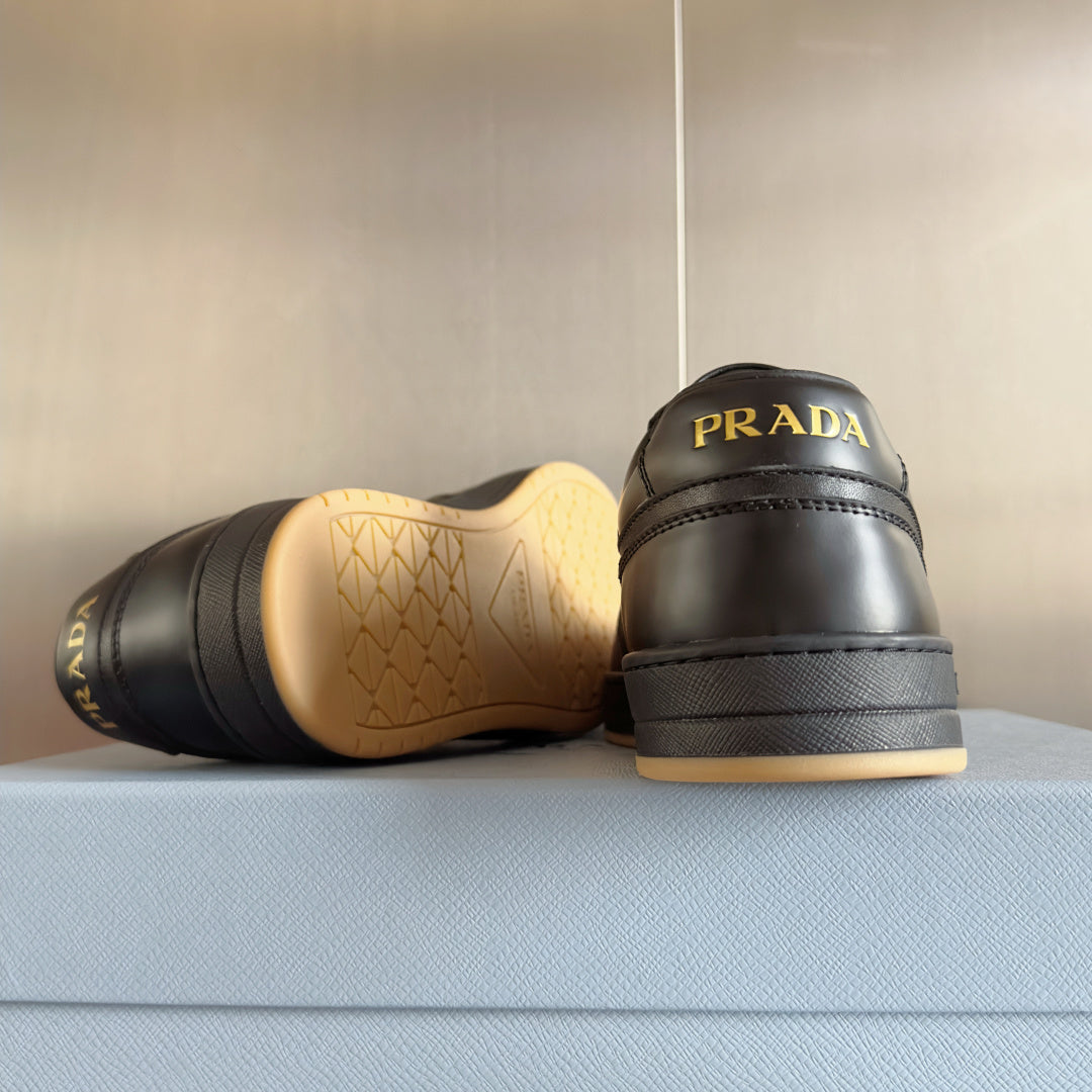Prada unisex sneakers heel and sole, dark leather with gum tread, pair on box