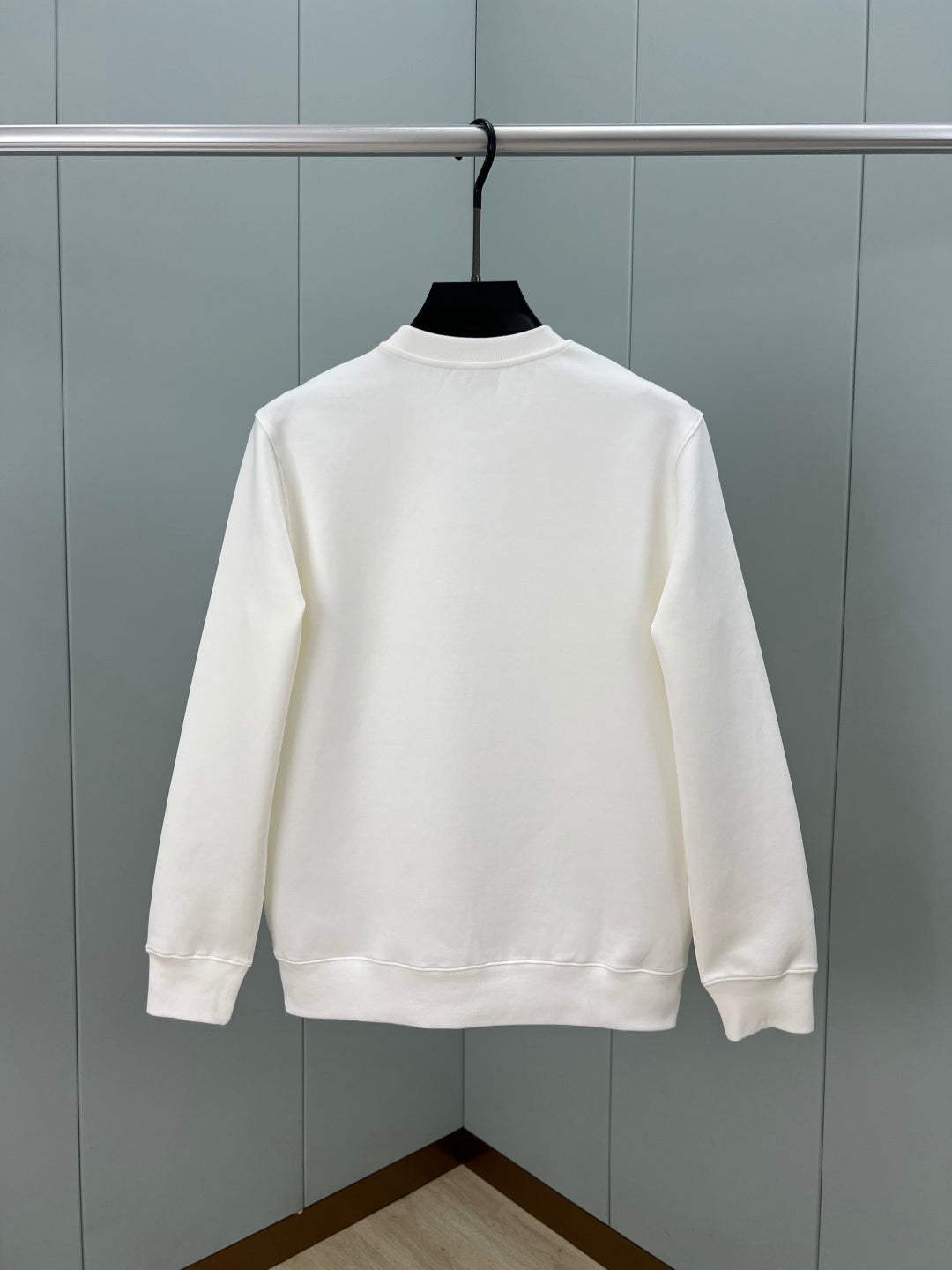 White Fendi sweatshirt back view with ribbed crew neckline and long sleeves