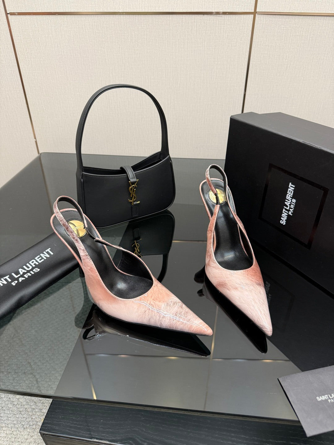 YSL women's pointed-toe stiletto heels, light pink speckled leather, black sling