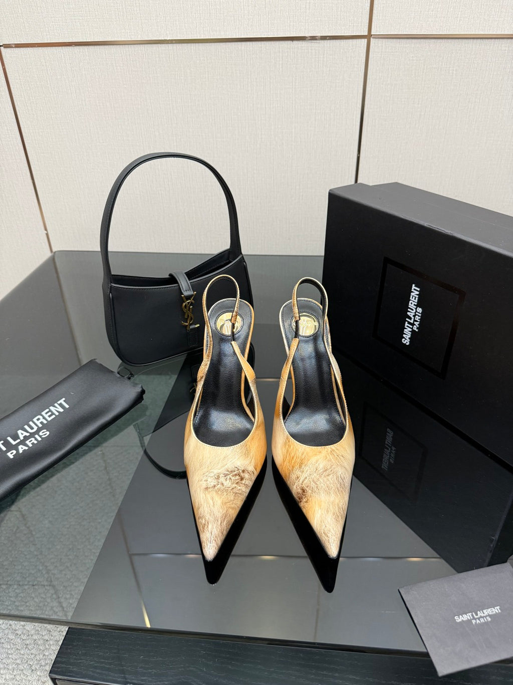 Women’s pointed-toe slingback heels, black with tan speckled texture and slim gold detail